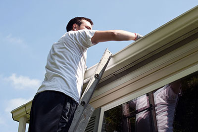 alcoil professional changing gutters roofing